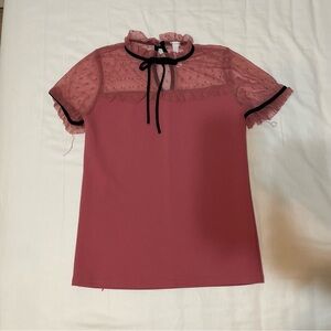 Pink and black sheer top with bow tie